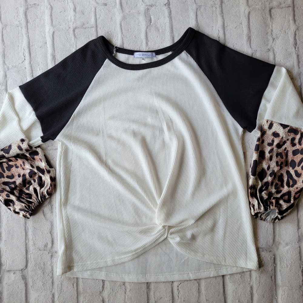 Miss Sparkle size medium top black white with leopard sleeves